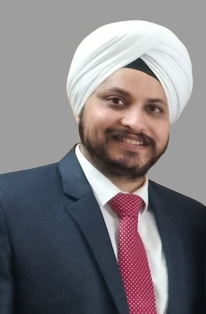 Dr. Jasmeet Chandhok smiling with a patient